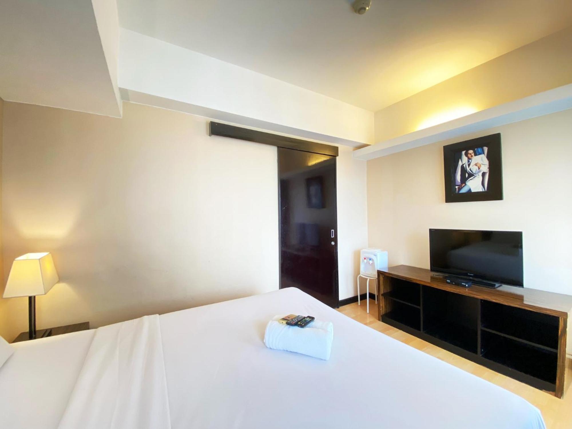 Cozy 1br At Braga Walk By Travelio